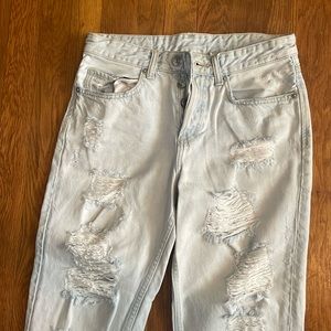 Distressed light wash jeans —gently worn